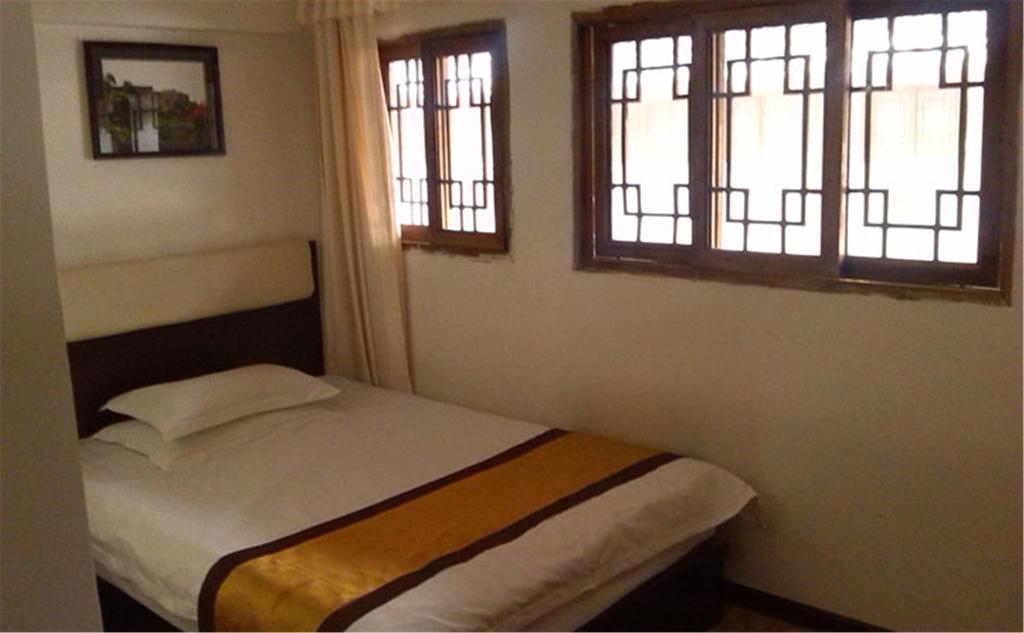 Wudangshan Yinjie Holiday Hotel Tancsangkou Szoba fotó